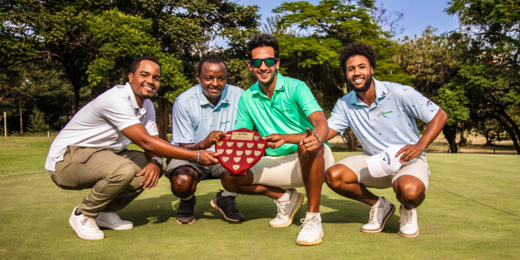 Mohit poses for a photo with fellow golfers.